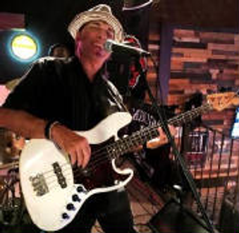 Man Playing His White Guitar