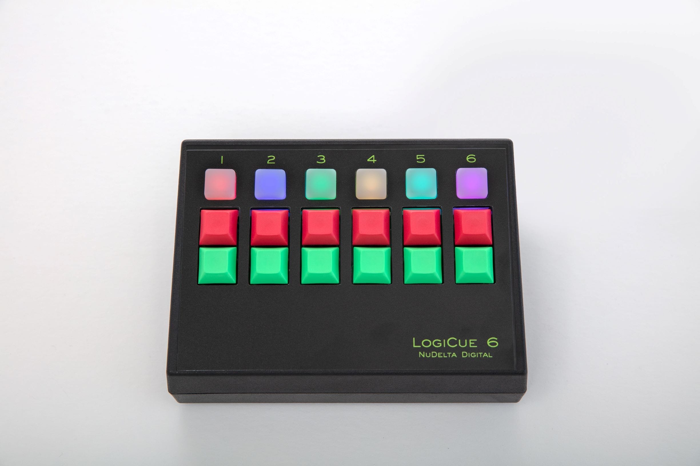 A picture of the LogiCue 6 Digital Cue Light System Controller with each of the 6 light emitting diodes illuminated in a different color.