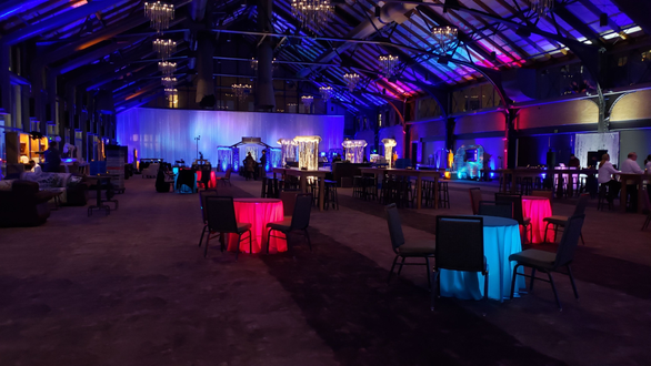 Renaissance Minneapolis, The Depot. Up lighting in blue and purple with tree gobos. Northern Lights dancing on the ceiling. Decor by Event Lab