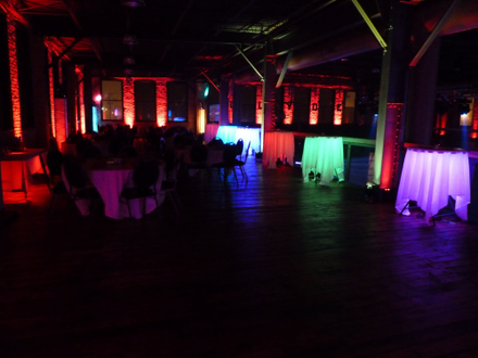 Wedding lighting at Clyde Iron Works with glowing cocktail tables.