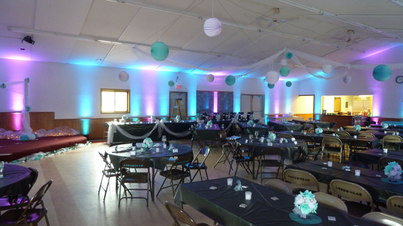 Wedding lighting in teal and magenta at the Arrowhead Town Hall.