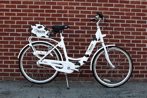 Mad cow branded bike share - bicycle looks like cow