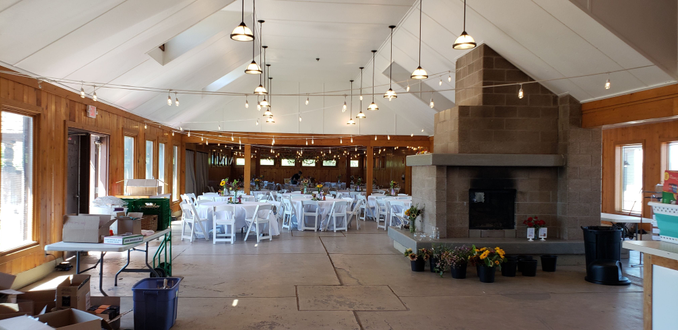 Wedding lighting at the Park Point Beach House with white bistro.