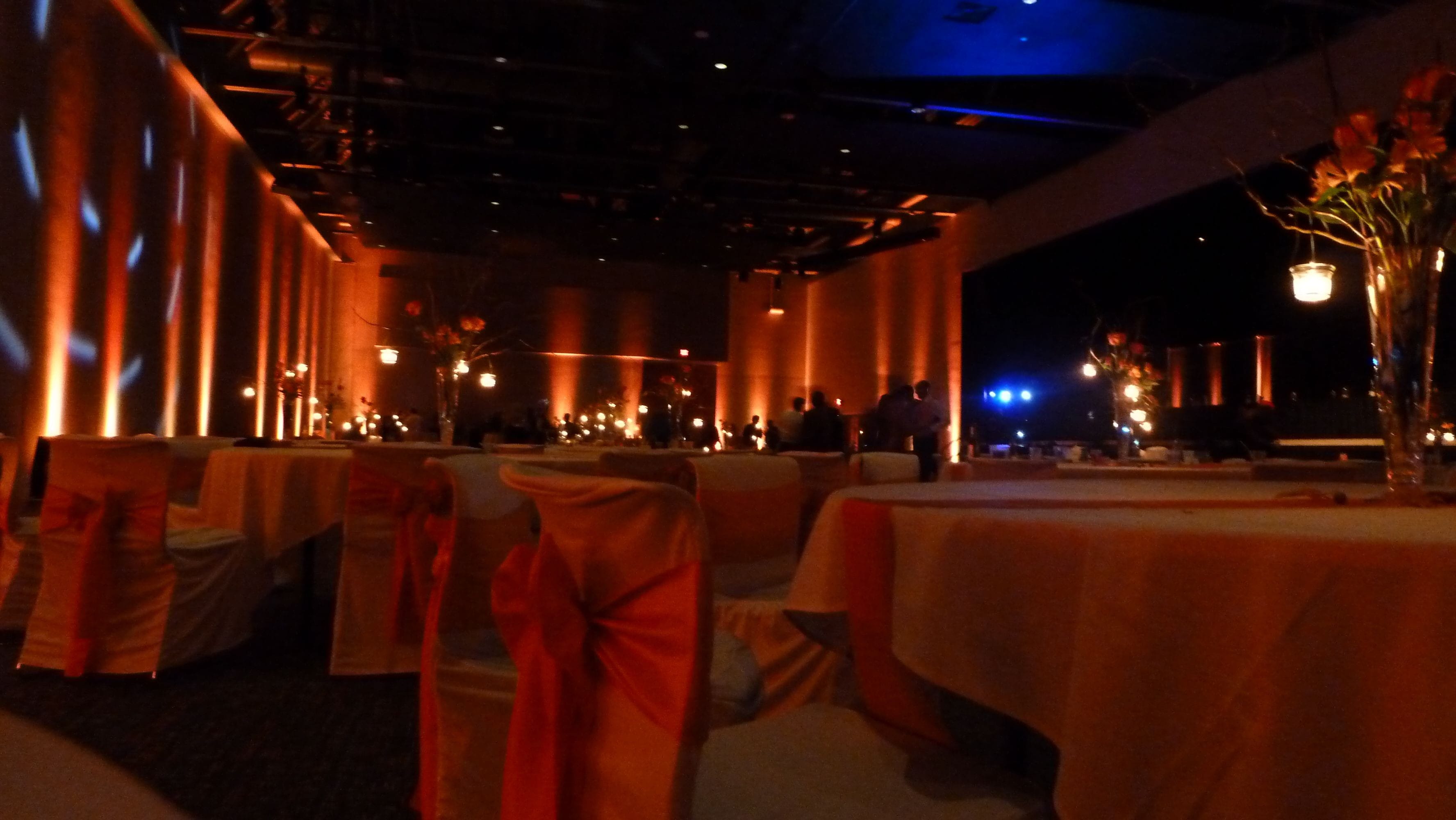 Wedding lighting at Black Bear Casino. Up lighting in orange for a fall theme.