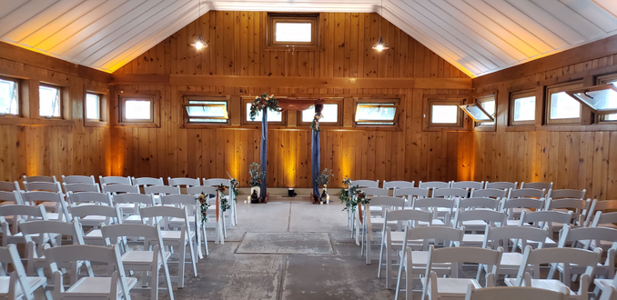 Park Point wedding with fall colors for up lighting by Duluth Event Lighting