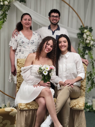 Same sex couple eloping with friends and family present to support
