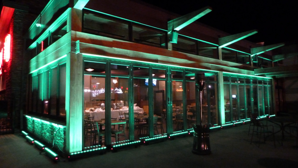Green building lighting on the Tavern on the Hill for St. Partrick's Day.
