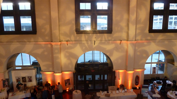 Up lighting in orange with gobos on the walls in the Depot Great Hall.