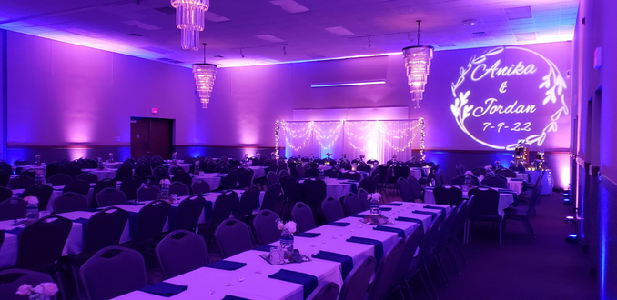 Barker's Island, 2015
Wedding lighting in blue and purple with a wedding monogram.