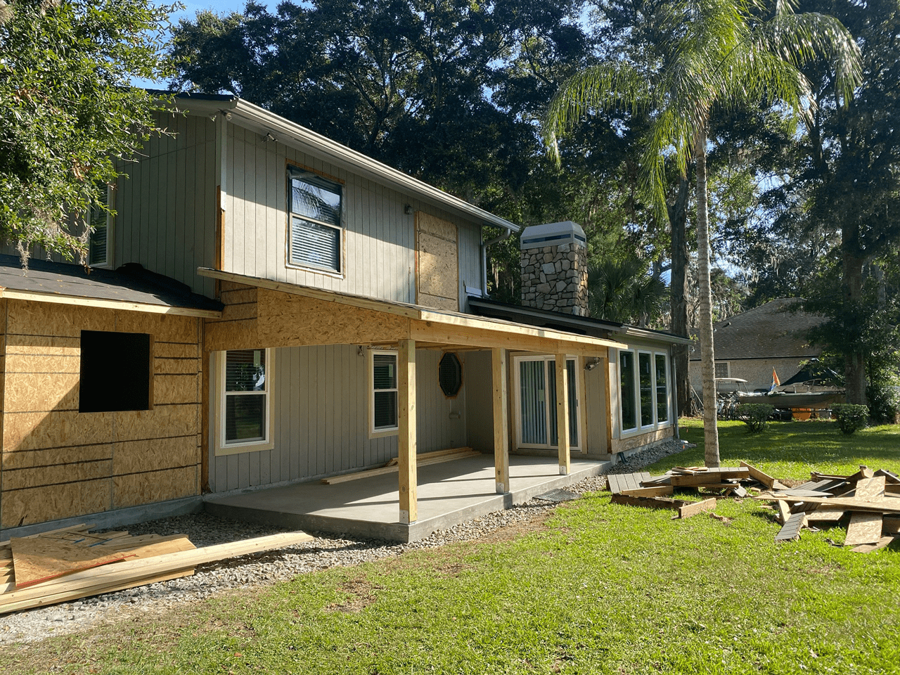 Shown here is the back of a home remodel we did for a customer, showcasing a room addition on the left, as well as an overhang for the back patio.