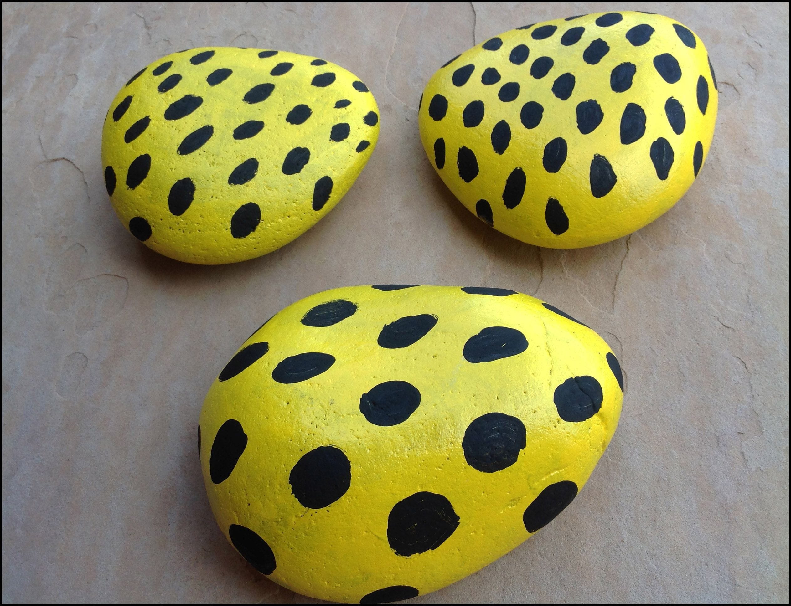 Colorful cheetah spotted rocks. A fun craft project.