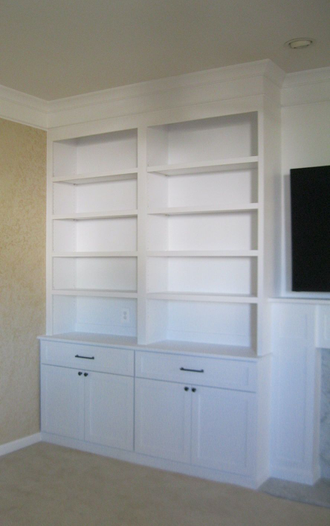 Finished Shelving with Storage and Fireplace mantel right view