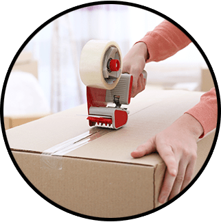 Hands Sealing a Box with a Tape