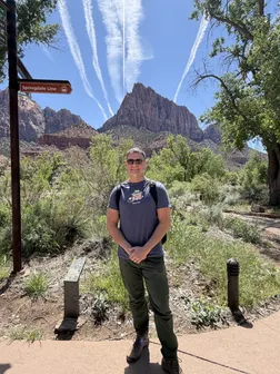John Manrique out hiking and enjoying nature.