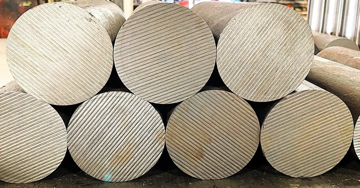 Raw metal pieces prior to being lathed.