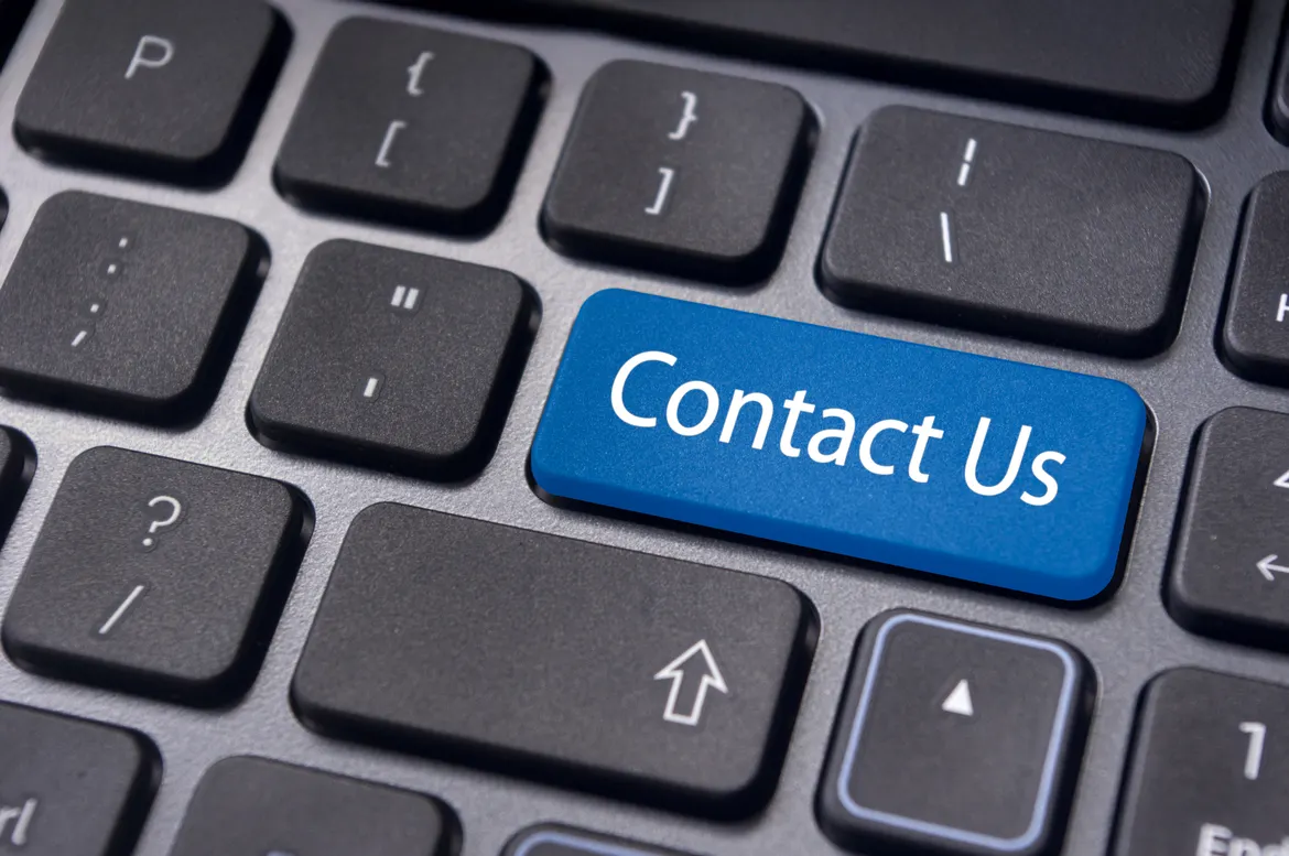 Keyboard with blue “Contact Us” button key
