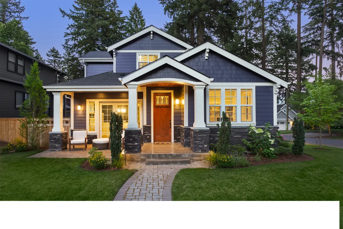 Charming blue house with a welcoming porch
